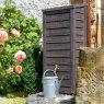 Watering can in garden